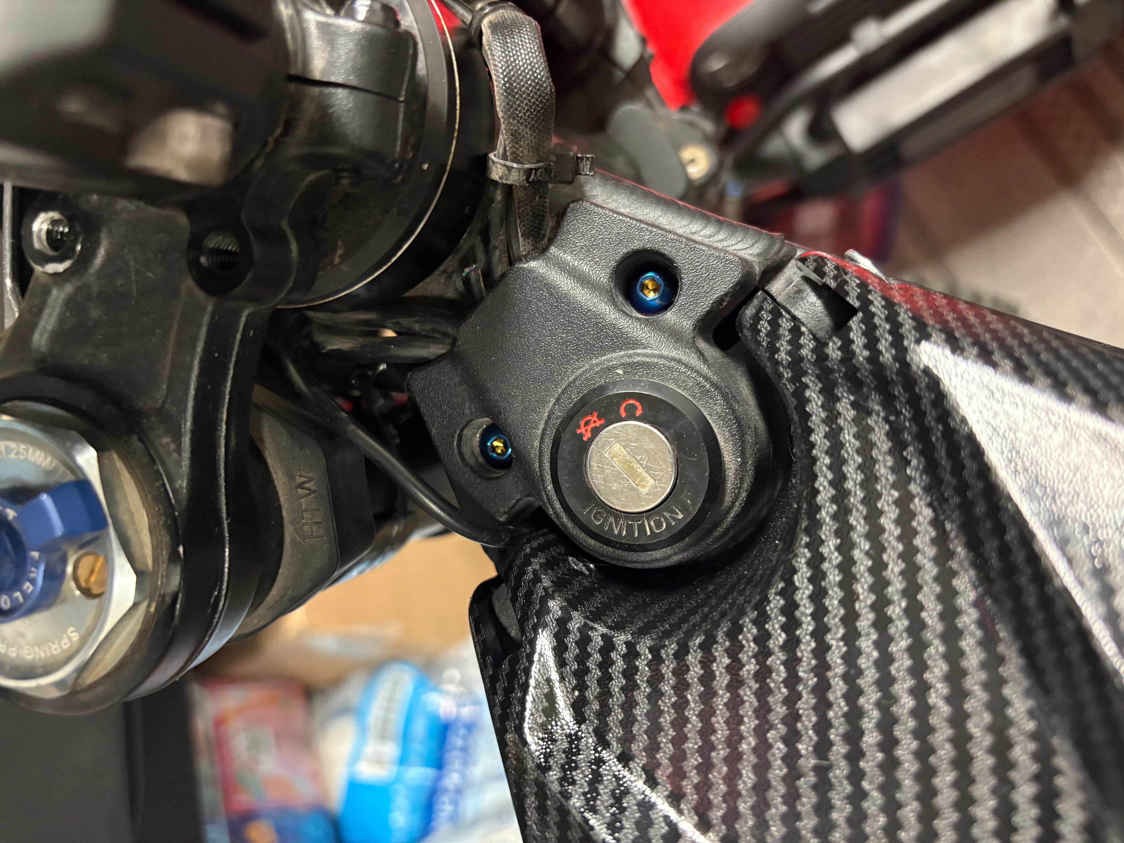 Titanium talaria key ignition bolts